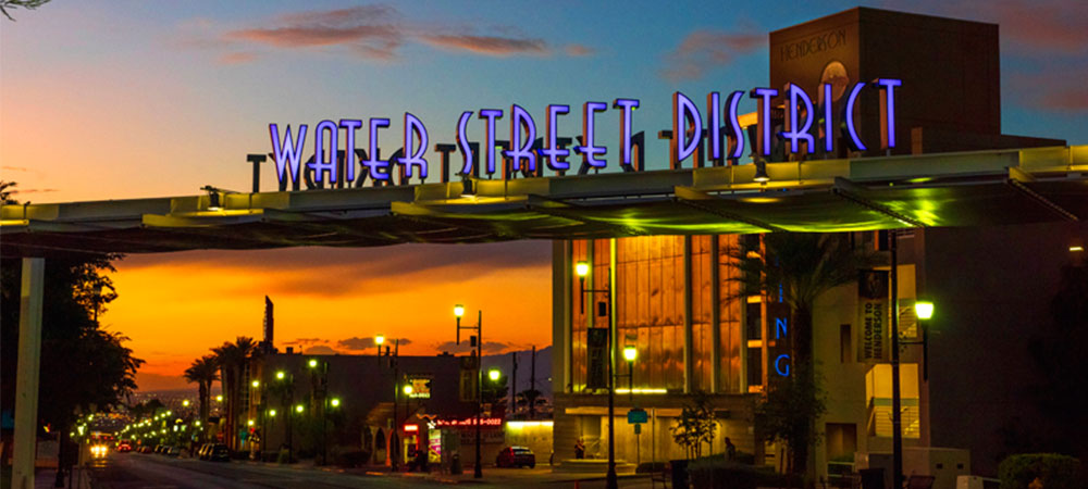 Water Street District sign at night